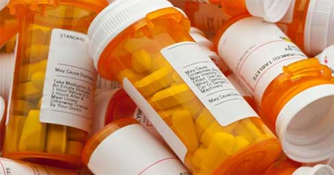 Causa raíz de la adicción a los opioides, imagen del frasco de pastillas